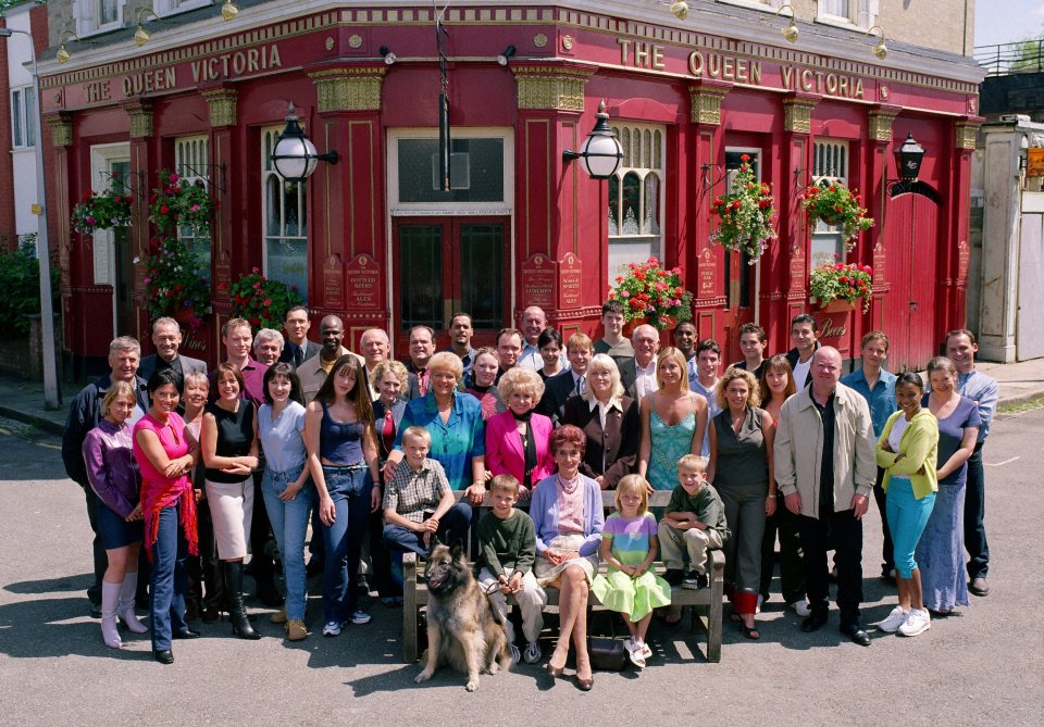 The EastEnders cast in front of the Queen Victoria pub.