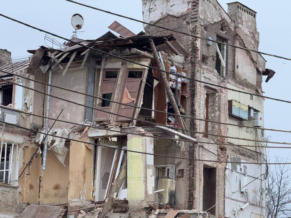 Emergency workers search for survivors after a missile strike in Kryvyi Rih, Ukraine