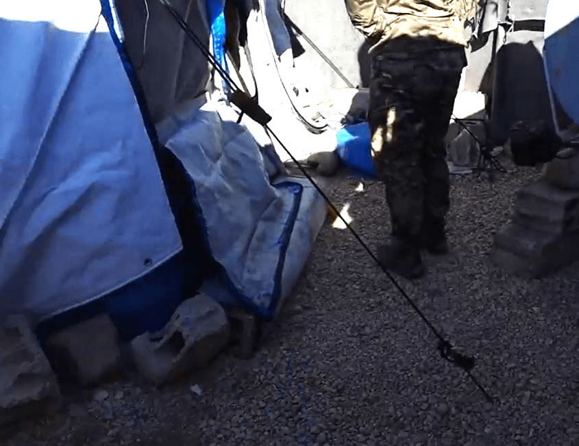 Soldier near a tent.