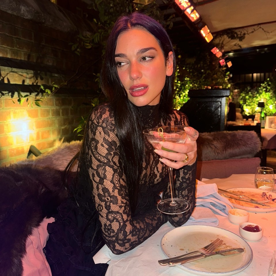 Dua Lipa has shown off her huge engagement ring after Callum Turner's proposal