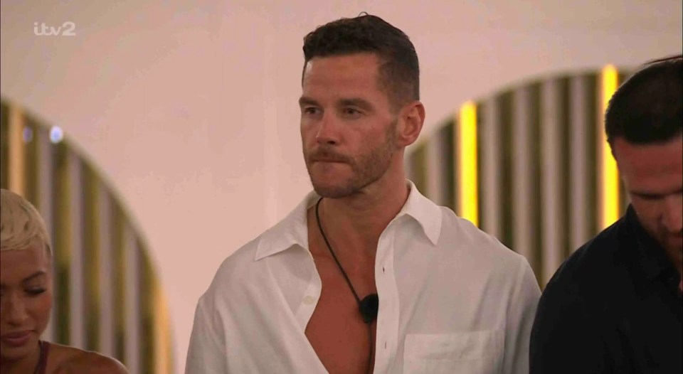 Screenshot from Love Island showing Scott Thomas and Luca Bish.