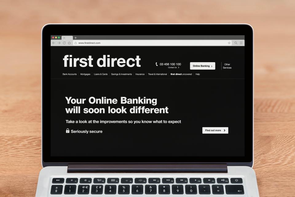 First Direct online banking website update announcement on a laptop.