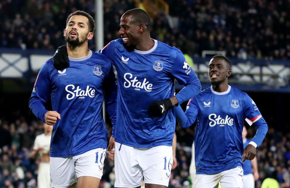 Everton players celebrating a goal.