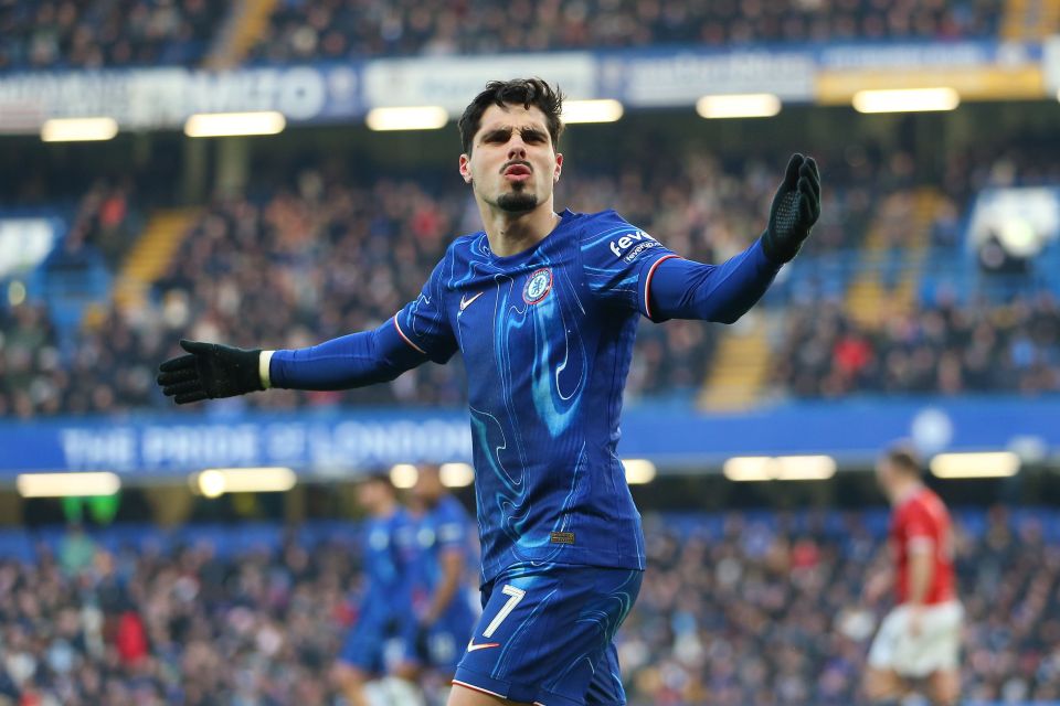 Pedro Neto of Chelsea disputes a call by the assistant referee.