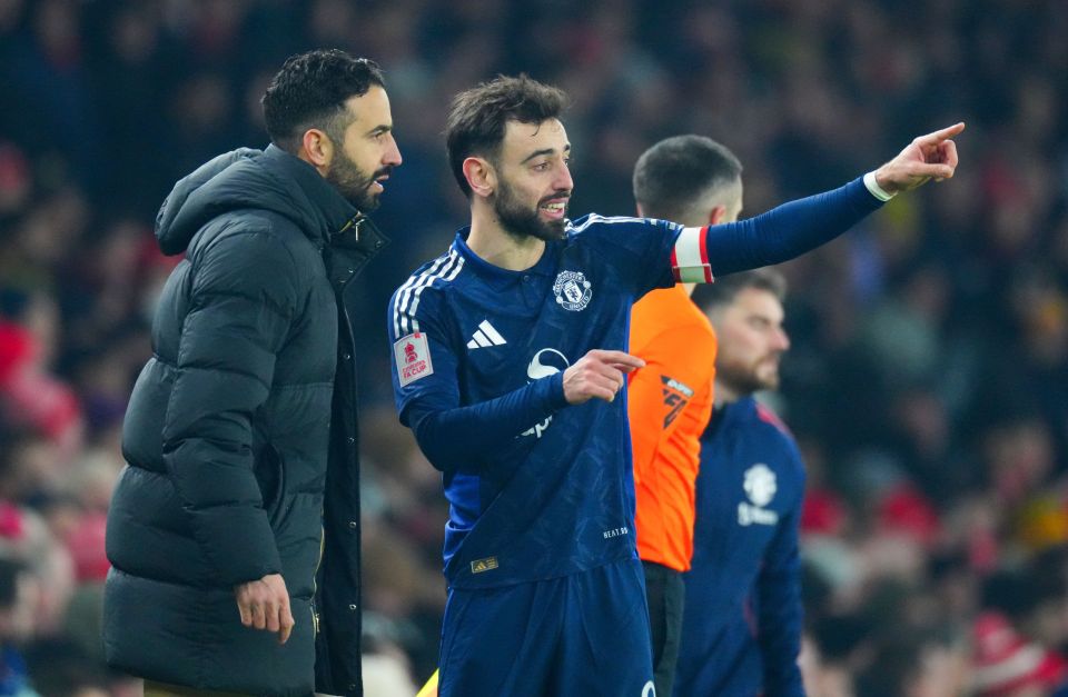 Manchester United manager and Bruno Fernandes on the sidelines.