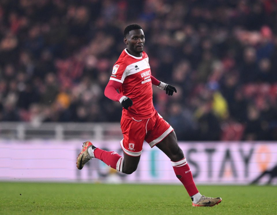 Emmanuel Latte Lath of Middlesbrough running on a soccer field.