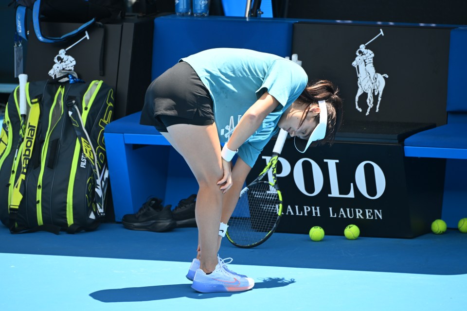 Emma Raducanu serving during tennis practice.