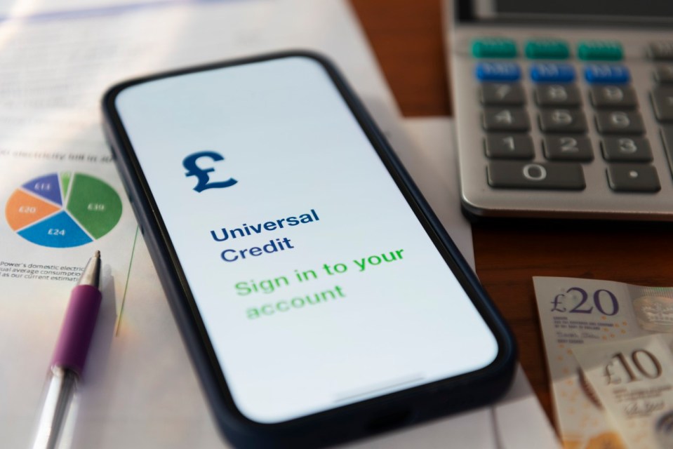 Smartphone displaying a Universal Credit app login screen.