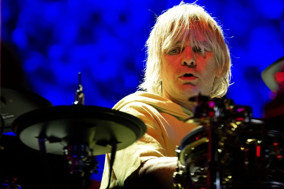 Zak Starkey, drummer for The Who, performing on stage.