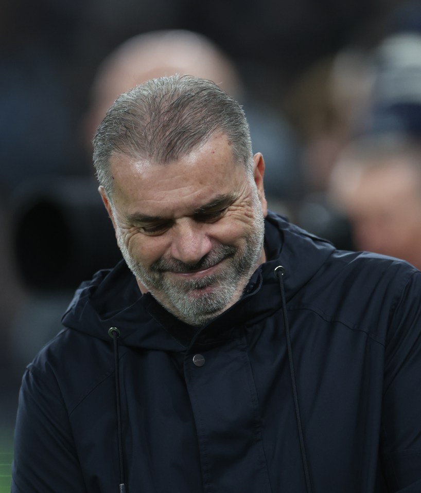 Ange Postecoglou, manager of Tottenham Hotspur, looking down.