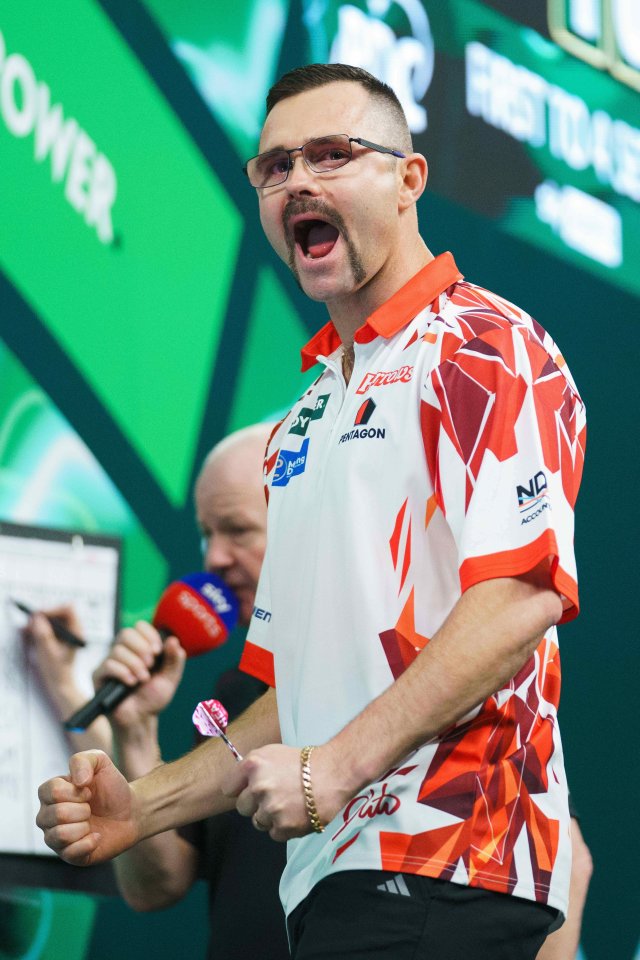 Damon Heta celebrating at the PDC World Darts Championship.