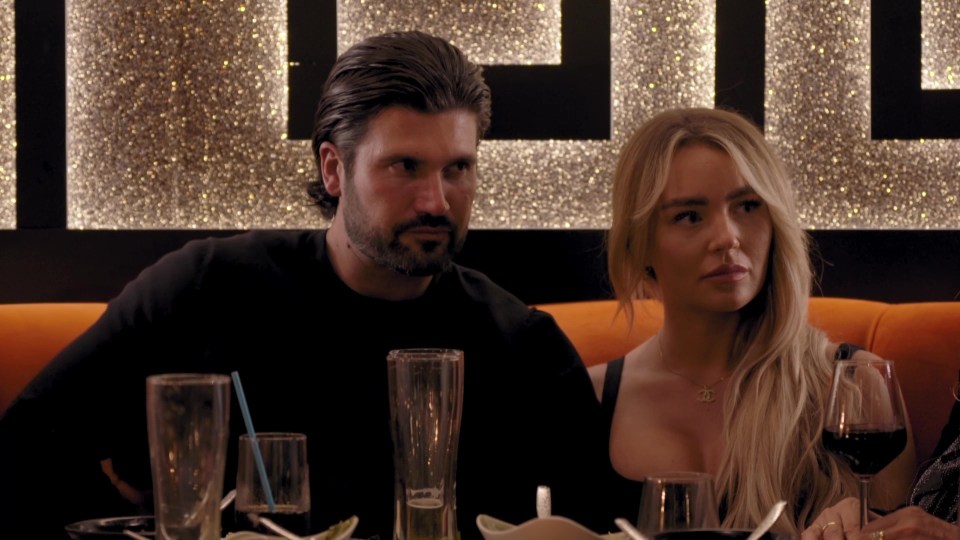 Dan Edgar and Ella Wise seated at a restaurant.