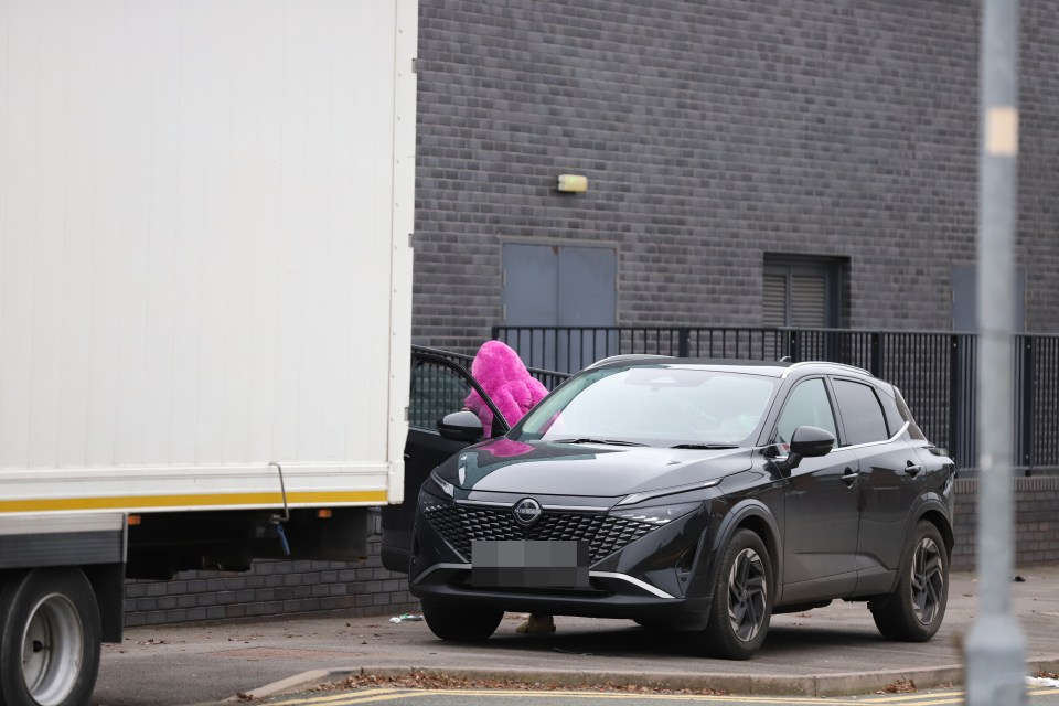 Katie Price getting a parking ticket.