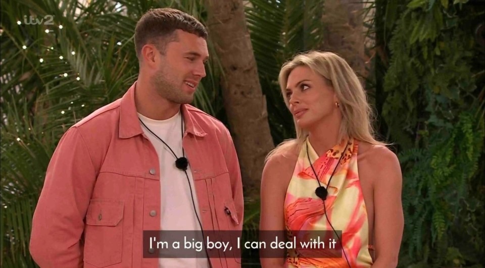 Screenshot of Love Island All Stars showing two islanders talking.