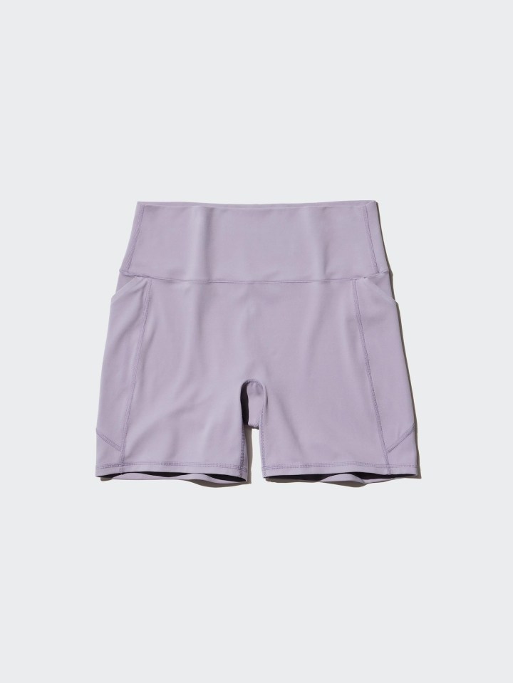 Lavender athletic shorts with pockets.