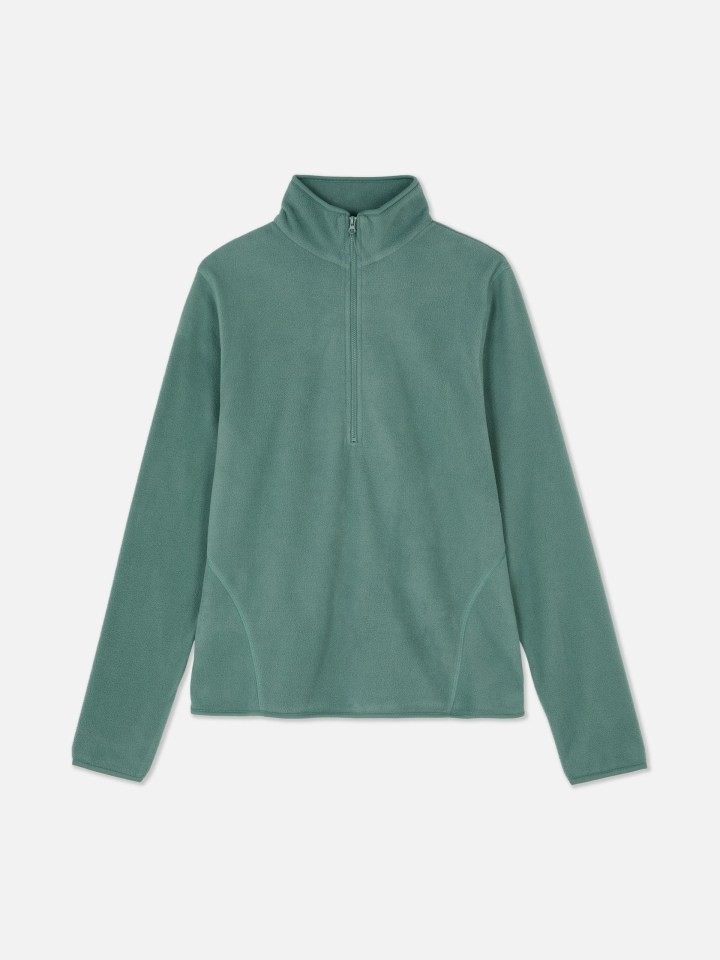 Teal fleece half-zip pullover.