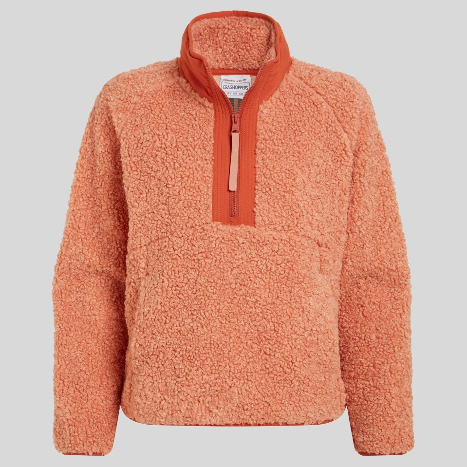 Coral-colored fleece zip-up jacket.