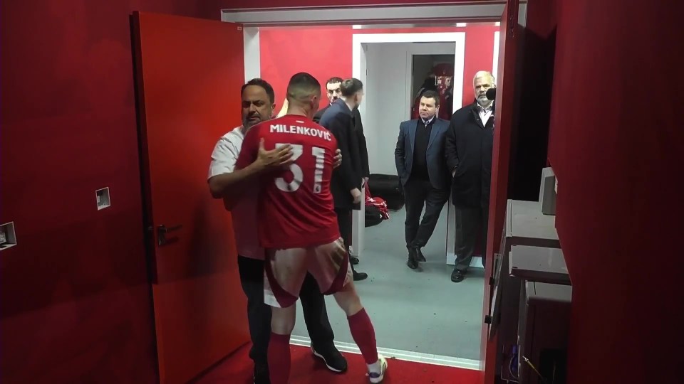 Nottingham Forest owner embracing player Milenkovic.