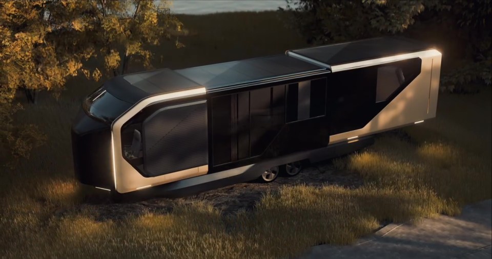 Futuristic tiny home campervan expanding its living space.