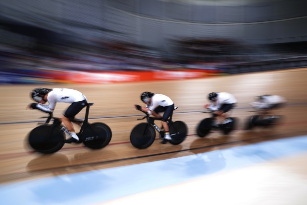 German cyclists in a team pursuit cycling race.