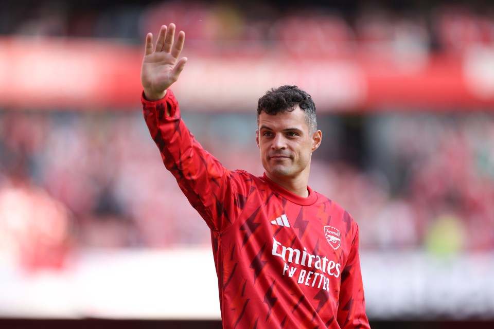 Granit Xhaka of Arsenal waves to the crowd.