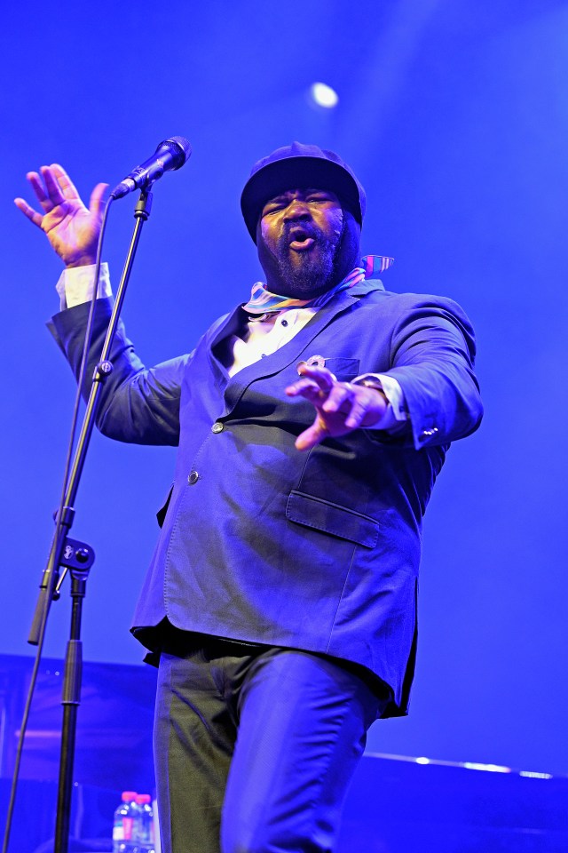 Gregory Porter performing at a music festival.