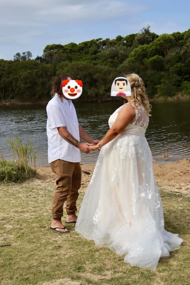 A bride and groom holding hands at an outdoor wedding ceremony.