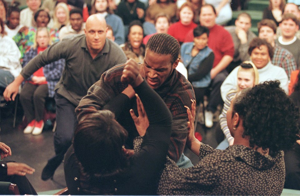 A man attacks a woman on a talk show.