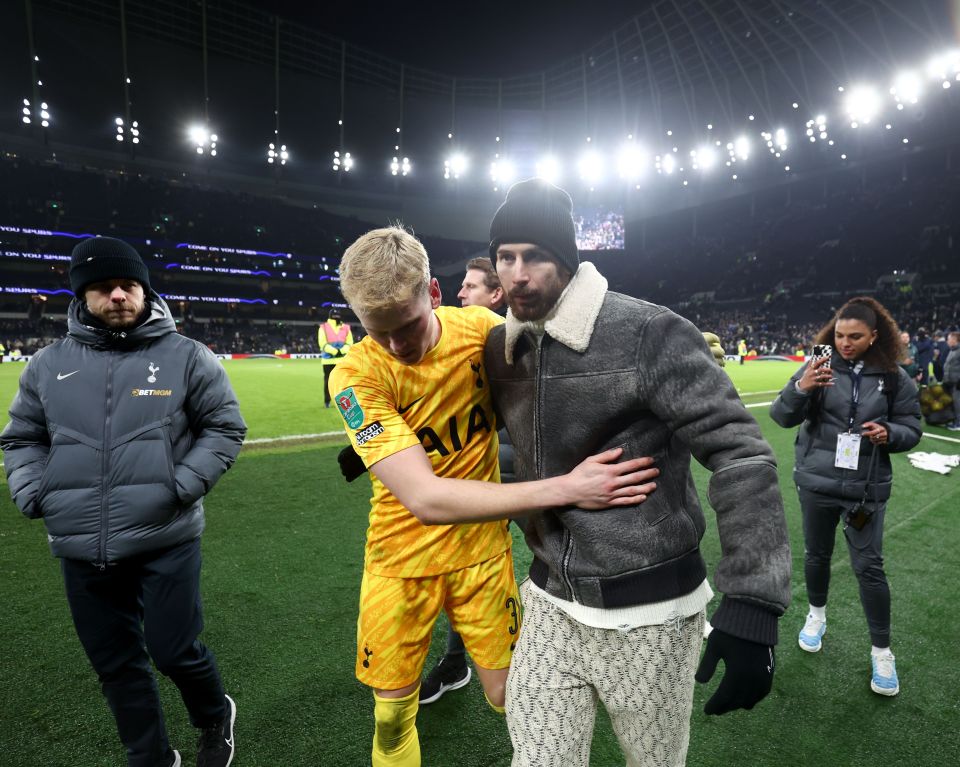 Guglielmo Vicario and Antonin Kinsky of Tottenham Hotspur after a football match.