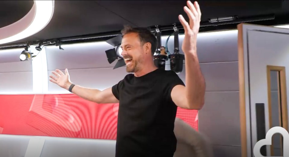 Jamie Theakston, cancer-free, celebrating on Heart Breakfast radio show.