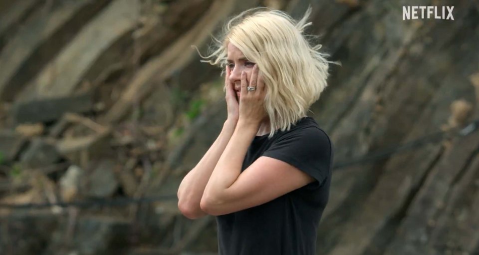 Holly Willoughby appearing emotional in a scene from Celebrity Bear Hunt on Netflix.