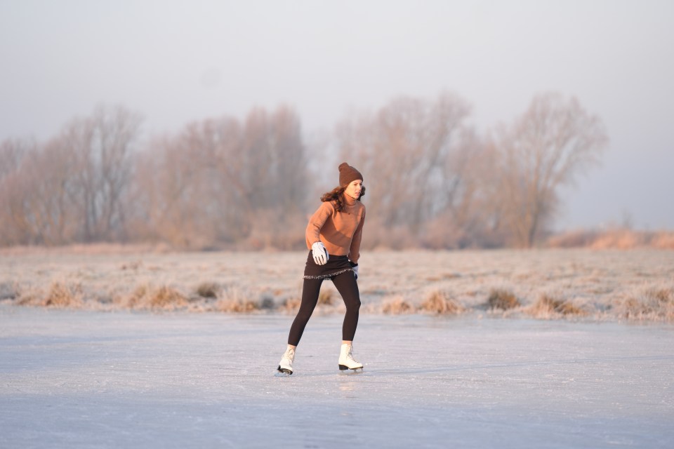 Ice skater on a frozen field.