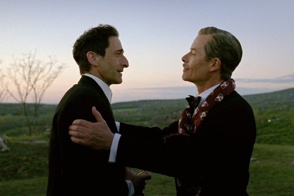 Adrien Brody and Guy Pearce in a scene from "The Brutalist."