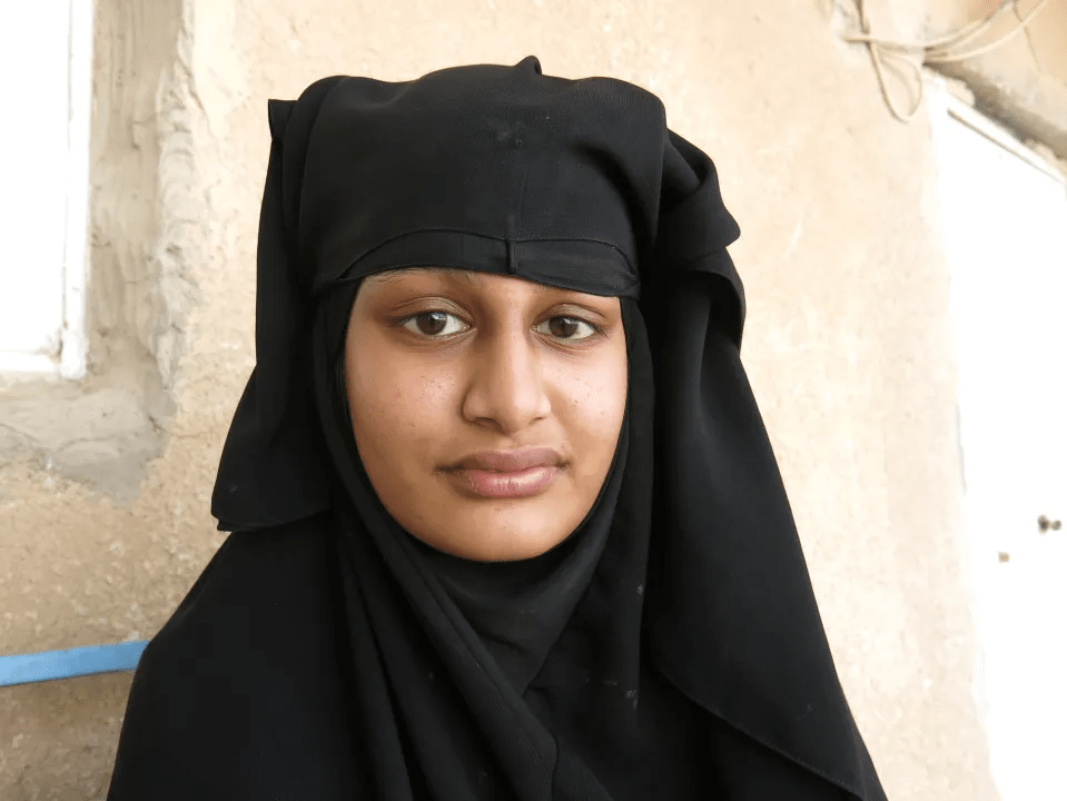 Young woman wearing a black hijab.