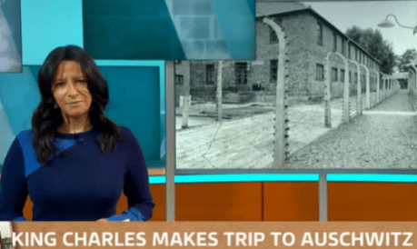 News anchor reporting on King Charles' visit to Auschwitz.