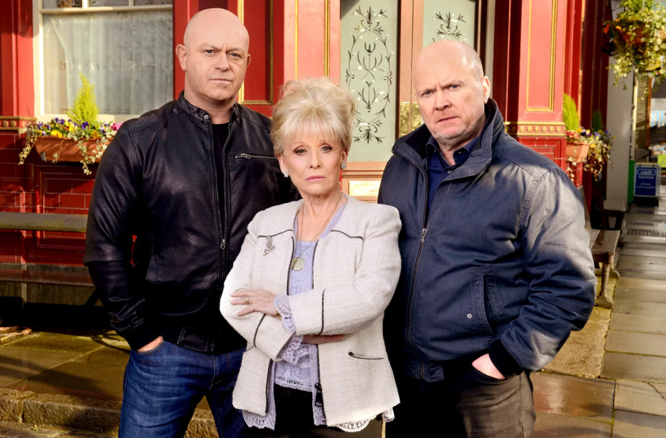 Three actors posing for a publicity photo.