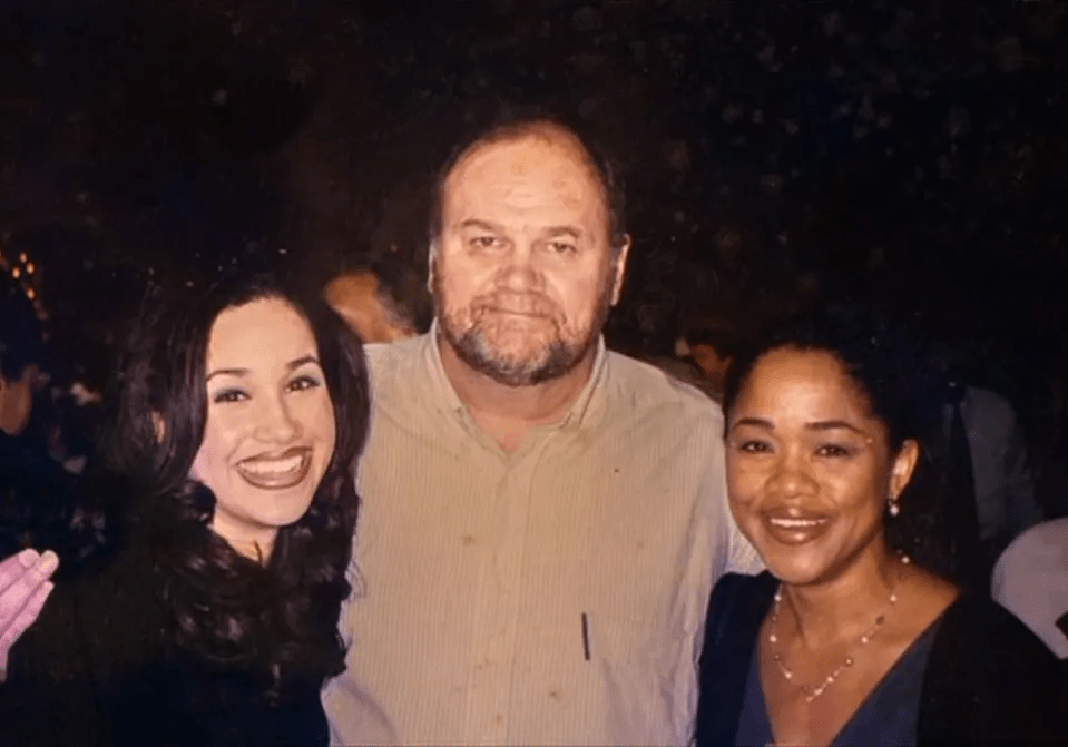 Meghan with her mother Doria Ragland and Thomas