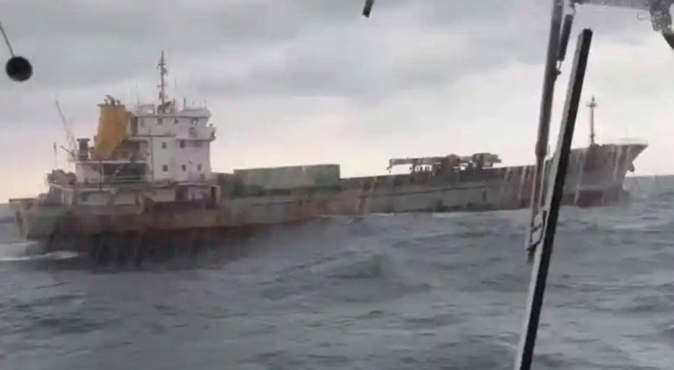 Cargo ship in rough seas.