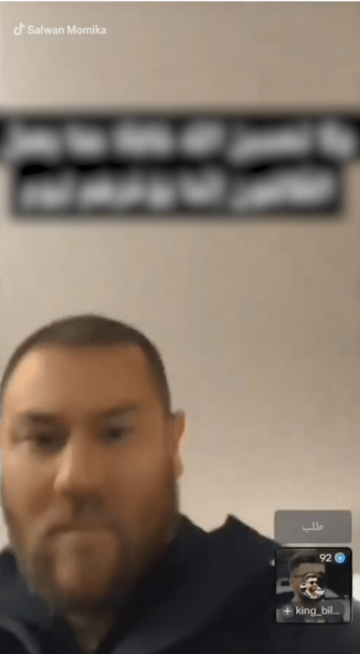 Screenshot of a man on a video call.