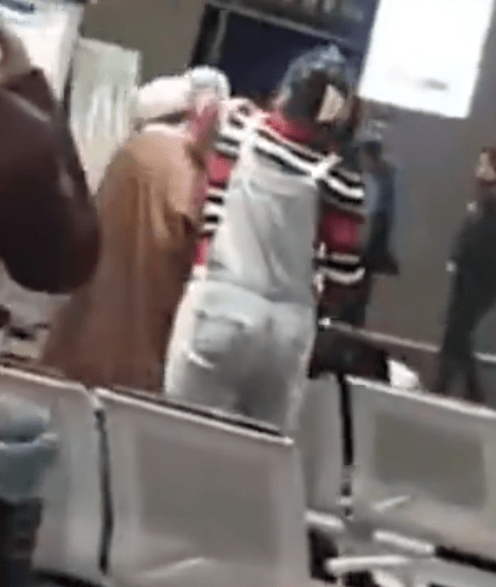 The moment a fed up Iranian woman snatched a turban off a brazen cleric at the airport