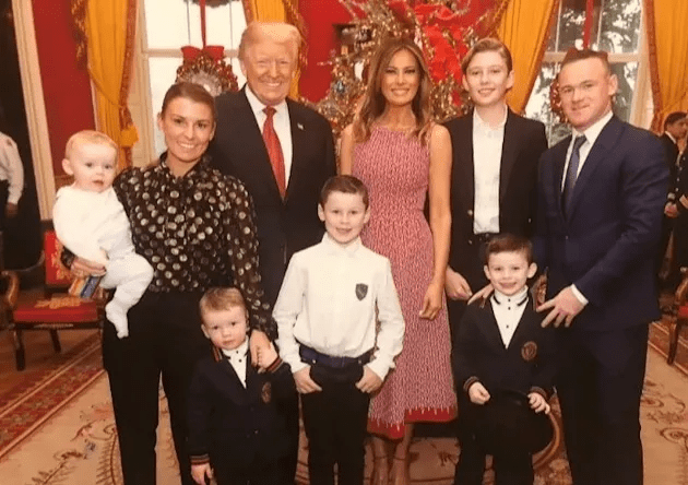 The Trump family with Wayne Rooney and his family.