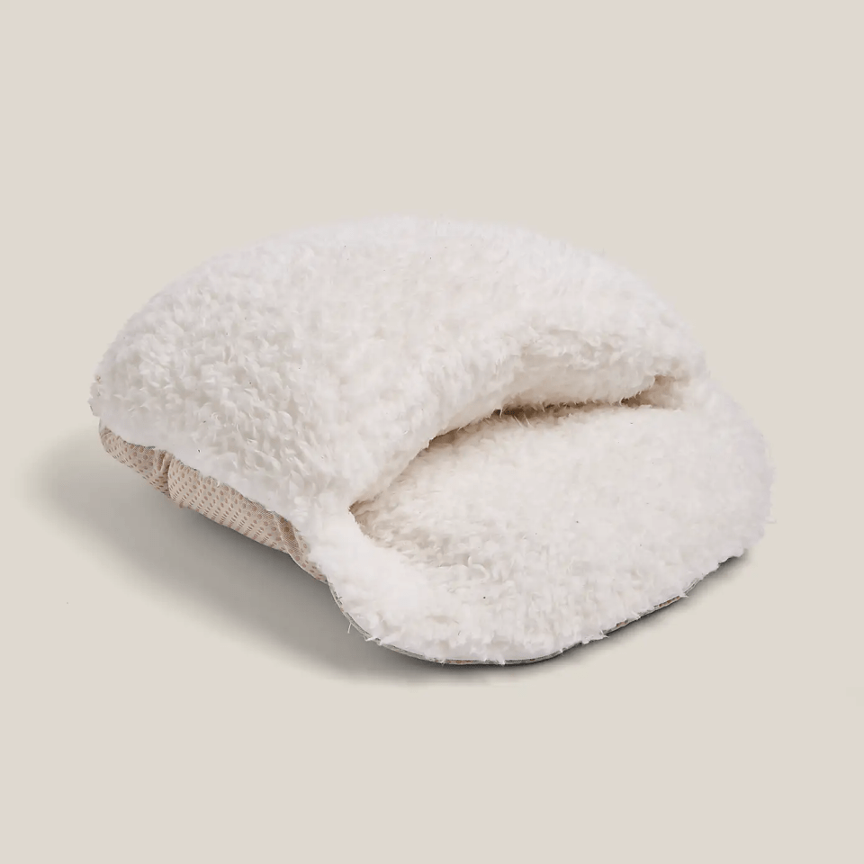 White fluffy pet bed.