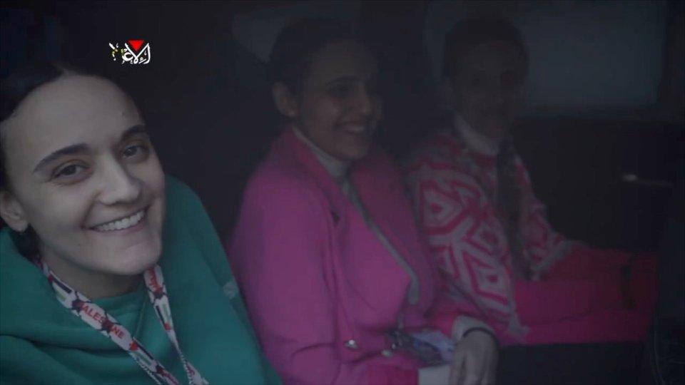 Three women sitting in a car.