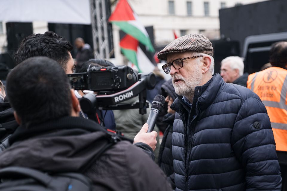 Jeremy Corbyn being interviewed at a rally.