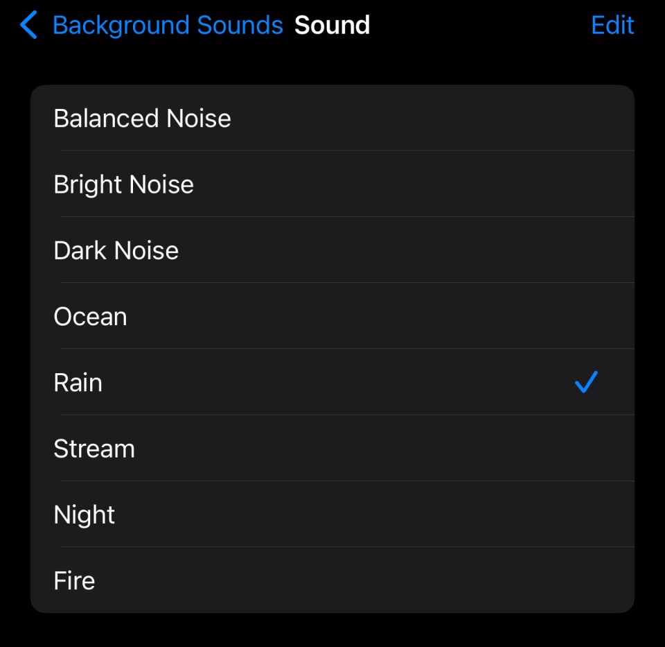 iPhone screen showing background sound options; rain is selected.