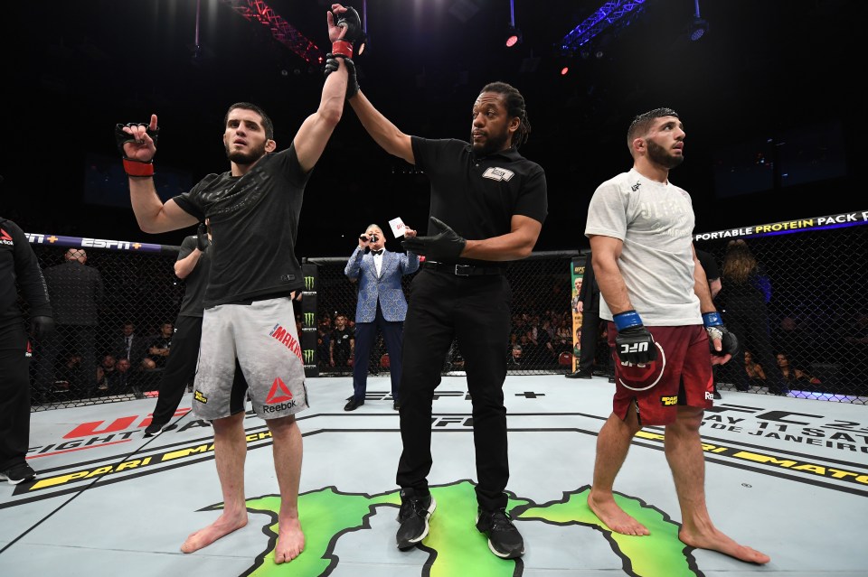 Islam Makhachev celebrates his UFC victory.