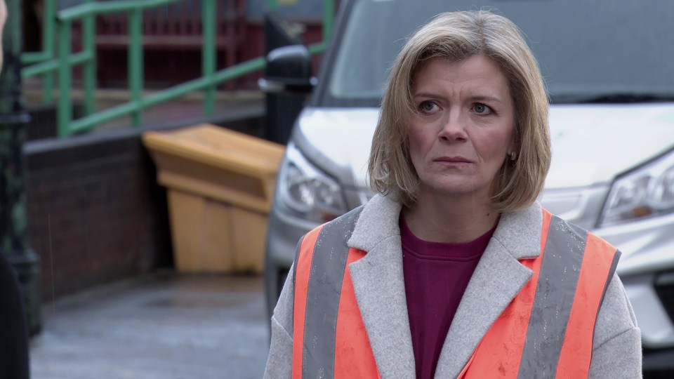 Leanne Battersby in a high-vis jacket picking up litter.