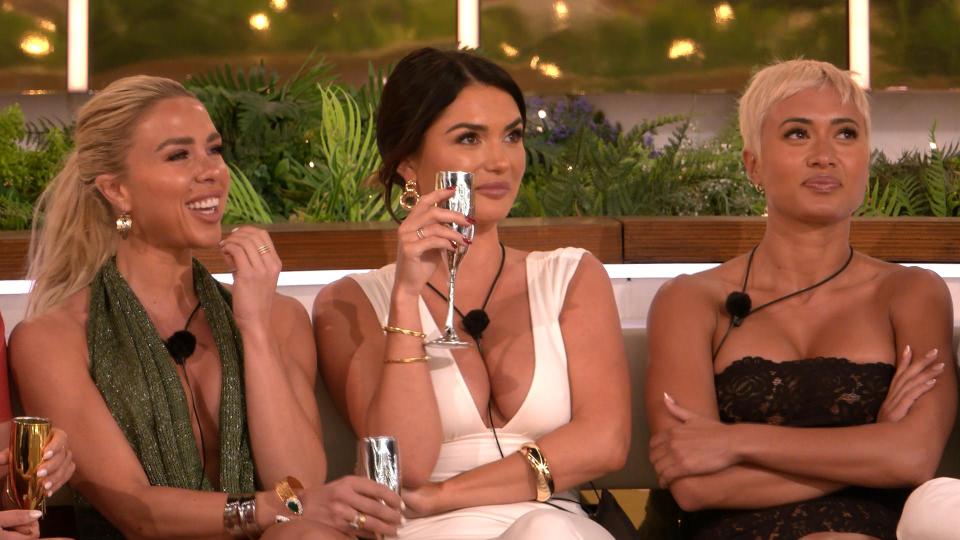 Three women from Love Island All Stars sitting together.