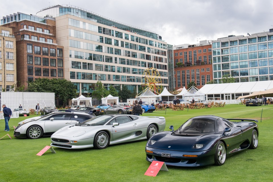 Three rare sports cars at an auction.