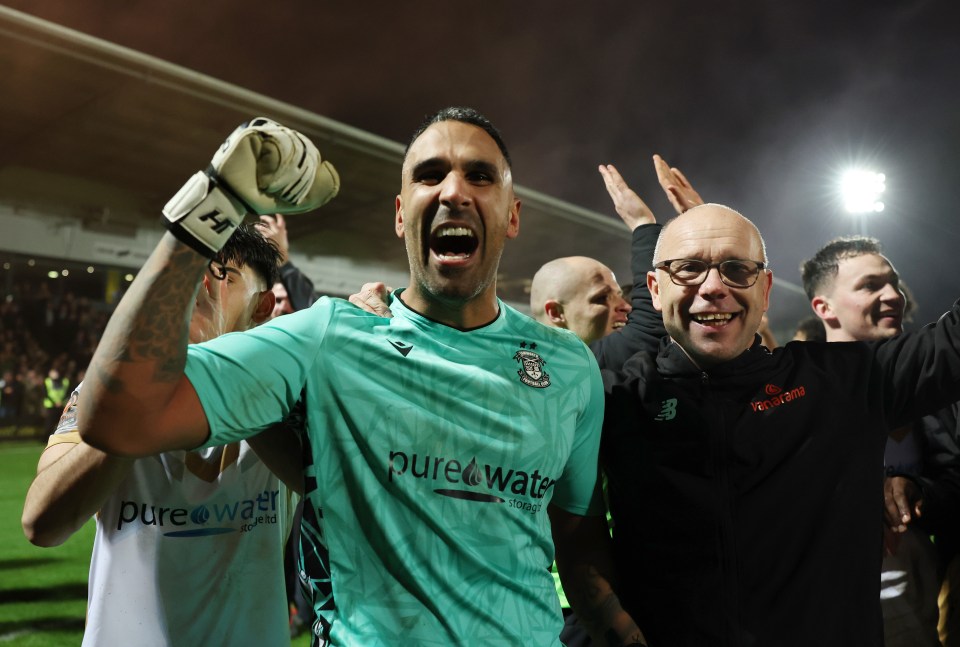 Boss Andy Peaks and keeper Jasbir Singh celebrate beating Burton